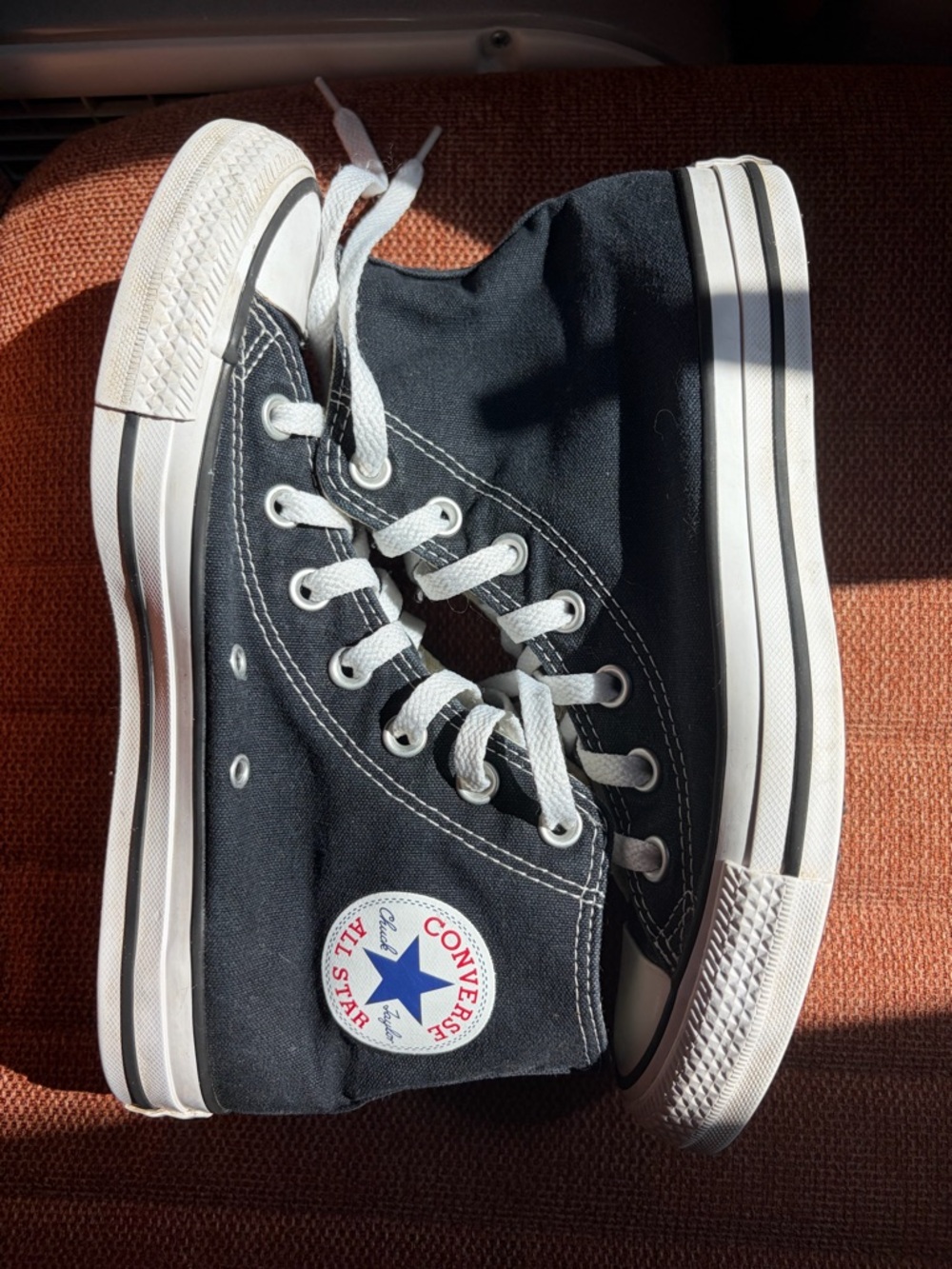 Black high top Converse women’s size 8 men’s 6
